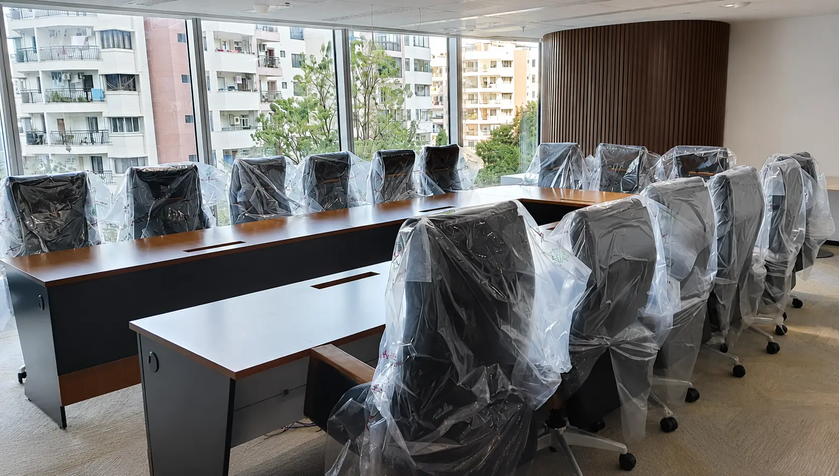 Boardroom furniture installation by Amit Industries